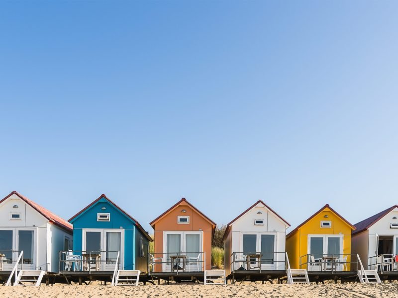 A wide angle shot of Camping De Nolle in Vlissingen, Netherlands under a blue sky